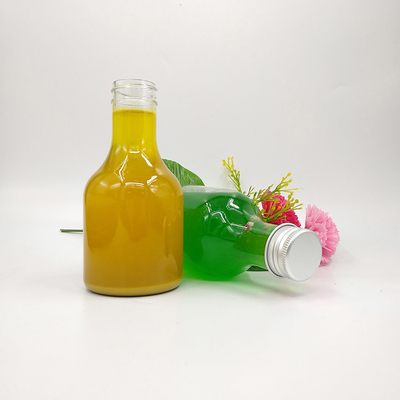 Bottiglie rotonde e quadrate di tè al latte per acqua da tè al succo
