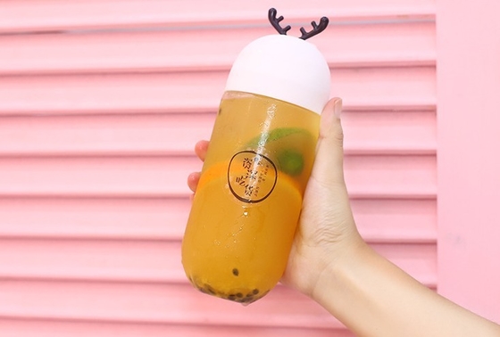 Bottiglie di tè al latte trasparenti e riutilizzabili in plastica con tappo