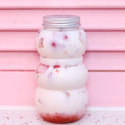Bottiglie di tè di latte di plastica a prova di perdite isolate con maniglie moderne