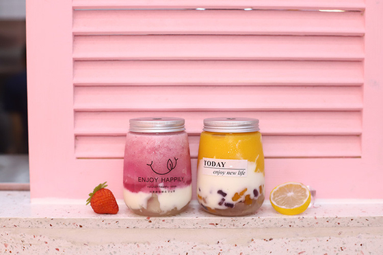 Maniglia di plastica colorata a prova di perdite Bottiglie di succo di latte e tè