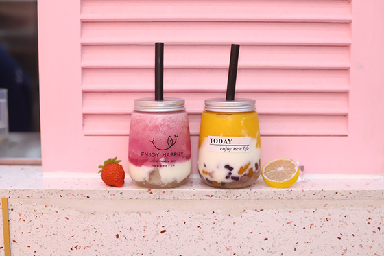 Maniglia di plastica colorata a prova di perdite Bottiglie di succo di latte e tè