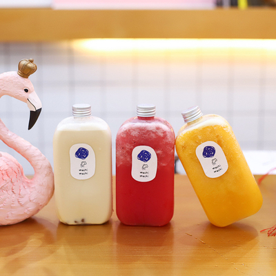 Bottiglia di succo di plastica trasparente e personalizzata con maniglia per bevande fredde
