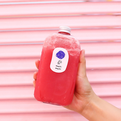 Bottiglia di succo di plastica trasparente e personalizzata con maniglia per bevande fredde