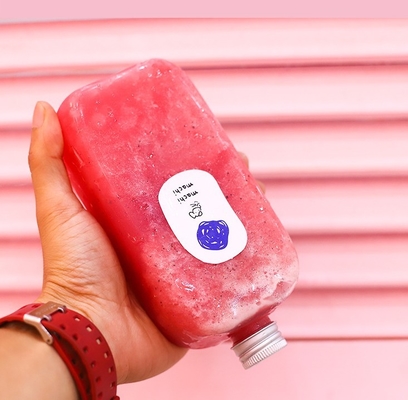 Bottiglia di succo di plastica trasparente e personalizzata con maniglia per bevande fredde