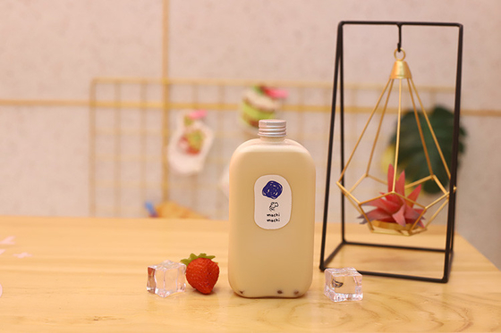 Manipola le bottiglie di tè al latte, il compagno perfetto per le bevande di medie dimensioni.