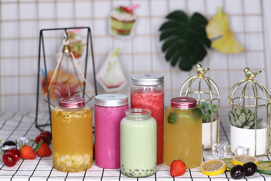 Bottiglie di tè al latte medie con manico e acqua inclusa in plastica resistente