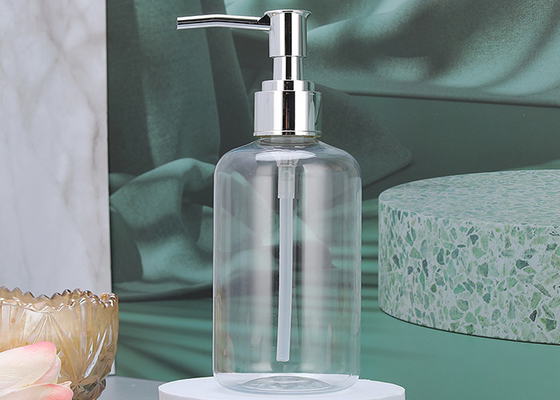 La bottiglia vuota dello sciampo con acciaio inossidabile pompa le bottiglie di plastica per gli oli essenziali, le lozioni ed il sapone liquido