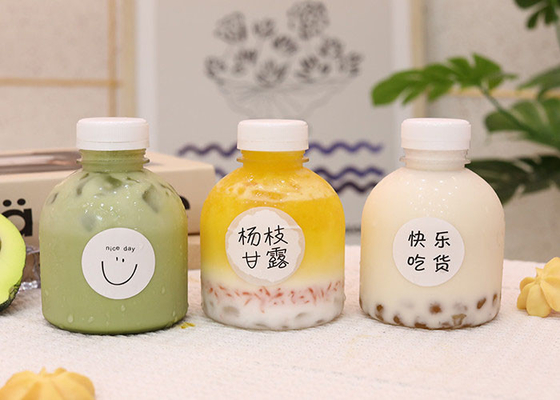 Bottiglia di succo PET bevanda di plastica trasparente imballaggio vuoto bottiglia di enzima del tè al latte con coperchio