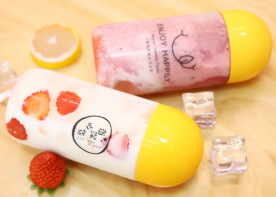 Bottiglia di succo PET bevanda di plastica trasparente imballaggio vuoto bottiglia di enzima del tè al latte con coperchio