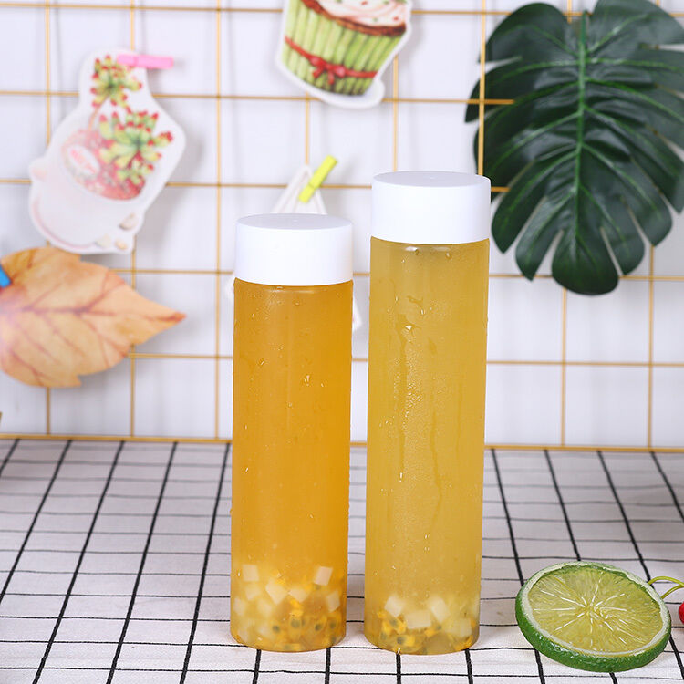 Manicotto Sì Bottiglie di tè al latte 05kg Velo sul coperchio Design impermeabile Ideale per imballaggi e distribuzione di bevande commerciali